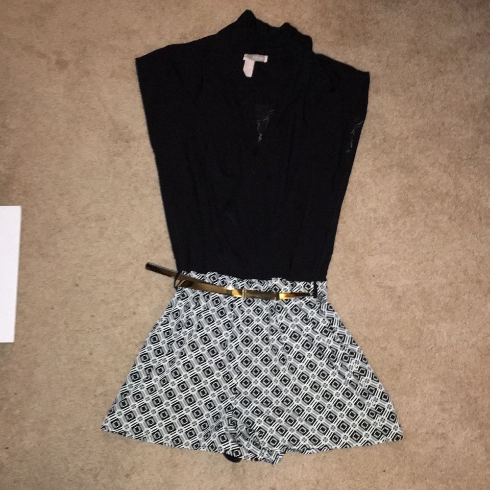 Summer romper. Black and white with lace back.